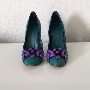 Marc Jacobs teal pumps with floral aplique.